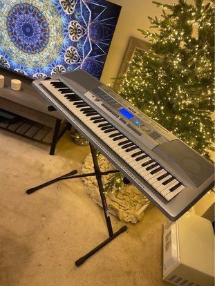 Yamaha Portable Grand 76-Key Electronic Music Keyboard with Portable Stand & Charger