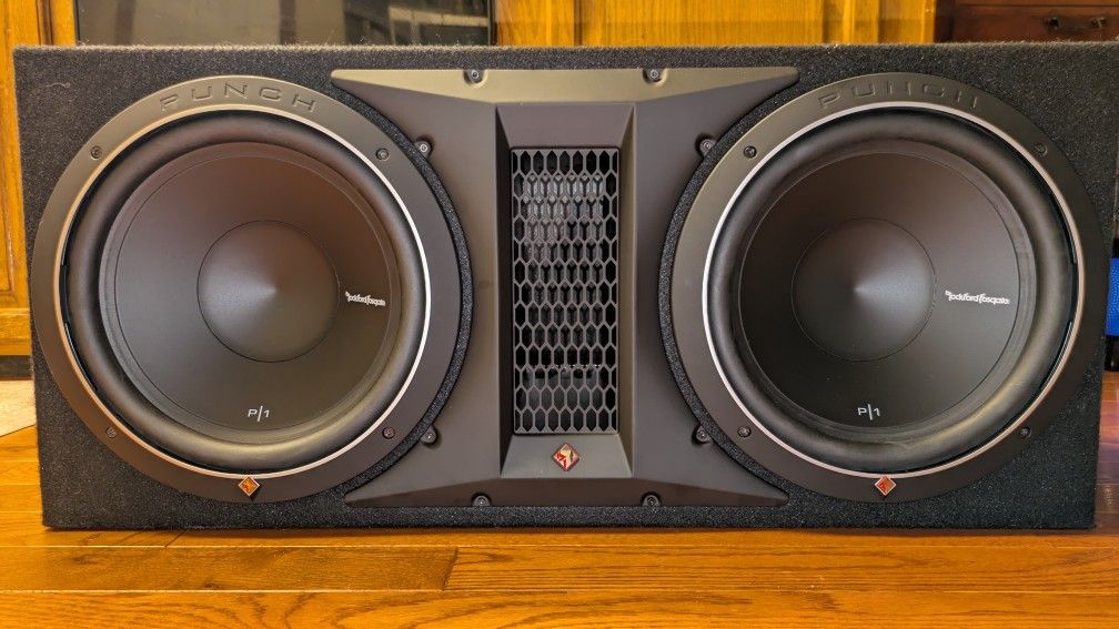 Dual 12" Rockford Fosgate Subwoofers and Enclosure w/ Hifonics Amp