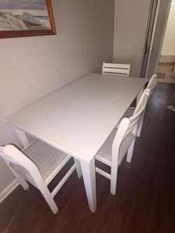 Solid wood table and painted oak chairs