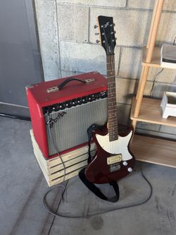 Fender Amp and electric guitar.