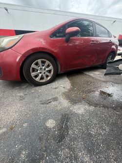 2015 red Kia rio