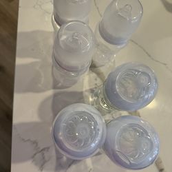 NEW 3 phillips Avent 8oz glass baby bottles and 3 even Flo 9oz plastic baby bottles
