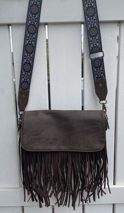 Woman’s Faux Leather Shoulder Bag With Fringe