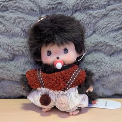 Cute monchichi plush doll with pacifier and knitted outfit