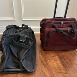Two never used  rolling travel bags