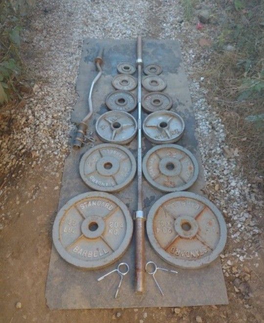 245lbs Olympic Weights+ 7ft 45lb Bar + Olympic Curl Bar