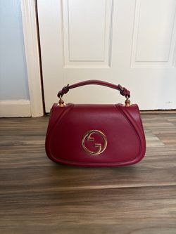 Burgundy top handle bag