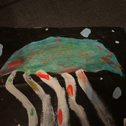 Jelly fish, and it also has Glow In The dark paint on it and it has paint splatters for the body of the fish in the legs mostly a light up