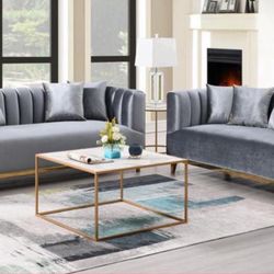 The Versa Living Room set exudes sophistication and modern luxury with its elegant design and impeccable craftsmanship. Featuring plush velvet . 