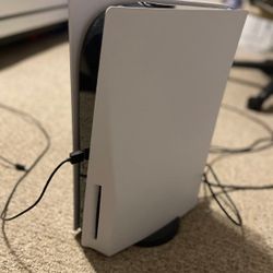 ps5 console disc with 2 controllers