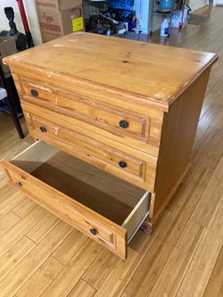Solid Wood Dresser 31 inches tall 33 inches long 21 inches wide very wide drawers $60