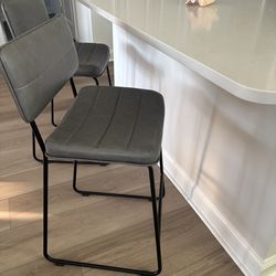 2 Counter height chairs  $75 Each 