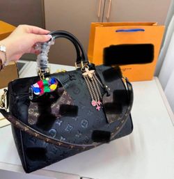 Bag W charms