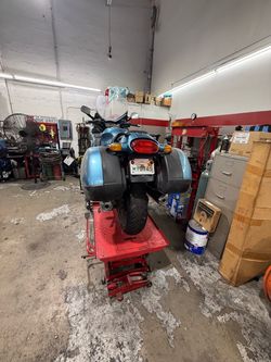 Blue Sport Touring Motorcycle with Saddlebags