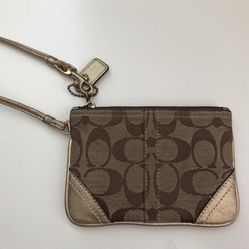Selling Coach Wristlet $20