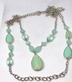 Charming Charlie double layered necklace in silver tone with pastel light green beads