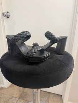 Woman’s 7 1/2 black braided strap heels