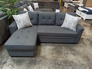 Photo Small Sectional Sofa with Pull Out Bed , Grey
