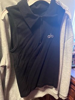 New alo Tank really Stretchy it could stretch up to a Large