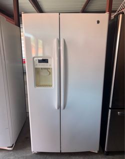 White GE Refrigerator And Freezer