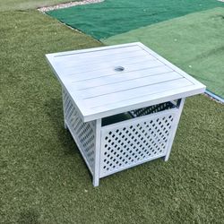 1 beautiful white small outdoor table can be used with umbrella asking $45 cash must pick up Broadway and apache buckeye az check out my page all type