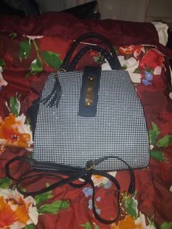 Black dotted hand purse with strap