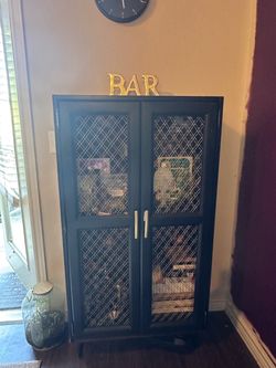 Bookshelf Black with floral backsplash