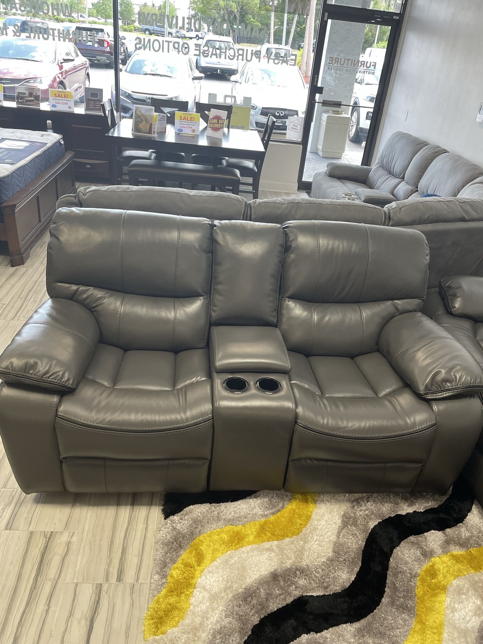 Fourth of July sale. Madrid, gray leather reclining sofa and loveseat set now $1199. Easy finance option. Same-day delivery.