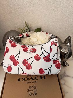 White and red coach bag for women