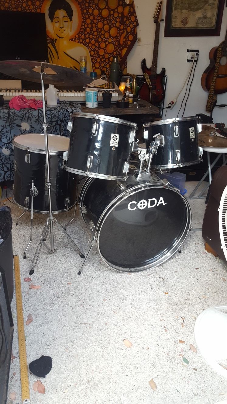 5 piece drum set hi hat and and one other symbol