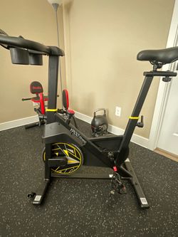 Stationary Bike and Dumbbell weights