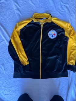 NFL Team Apparel track jacket features the Pittsburgh Steelers logo embroidered on the left chest with contrasting yellow sleeves