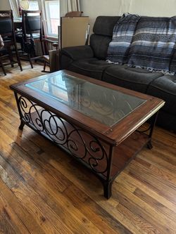 Wood and Wrought Iron Glass Top Coffee Table