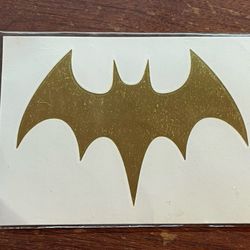 Gold Batman symbol temporary tattoo 