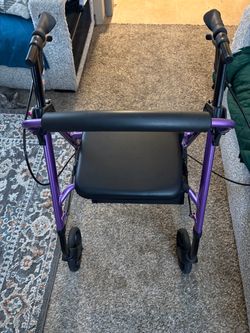 Walker with wheels and seat