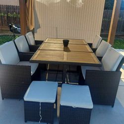 11 Peice Wicker Patio Table With Chairs.