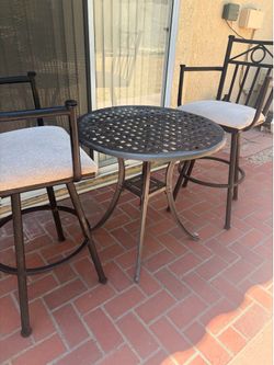 Outdoor table H28  round 29. 2 chairs  H 29 to seat  L 16