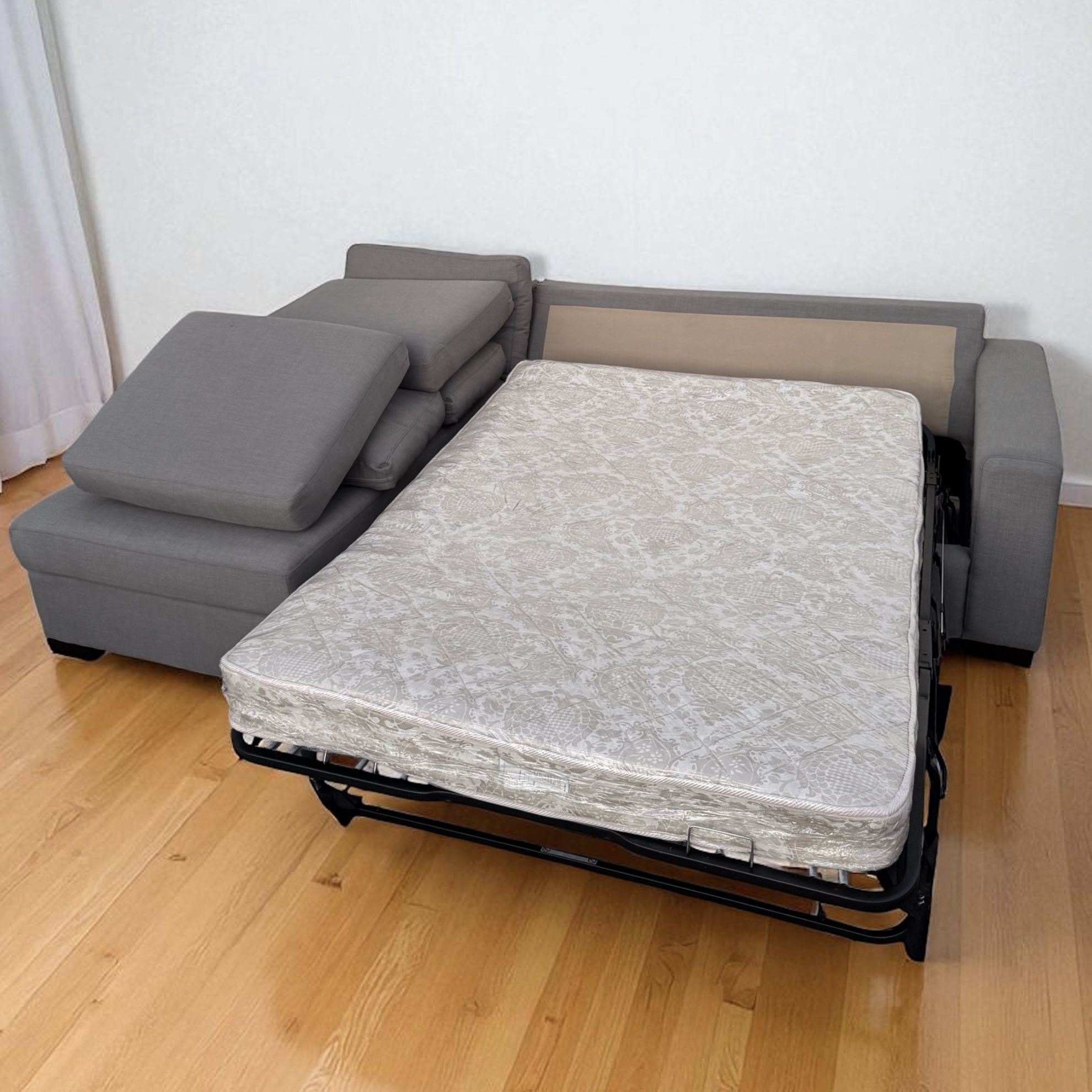 GREY SECTIONAL COUCH / HIDE A BED