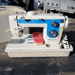 Sewing machine dressmaker