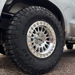 17x9 KMC IMS WHEELS AND TIRES 35/1250/17 LEAO XT