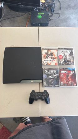 PS3 Slim Console with Controller and 4 Games