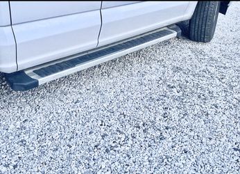 Chrome and black SuperCab/Extended Ford F150 running boards