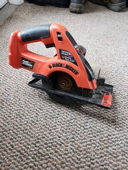 Black and Decker 14.4v trim saw. Can use Dewalt batteries.