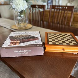 Wooden chest and checker set with storage drawer