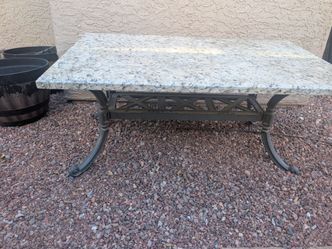 Granite and wrought iron table