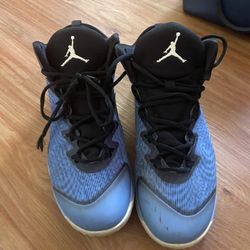 Blue and black Jordan’s size