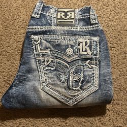 Rock Revival Slim Straight Blue Light Wash Distressed Embroidered Denim Jeans