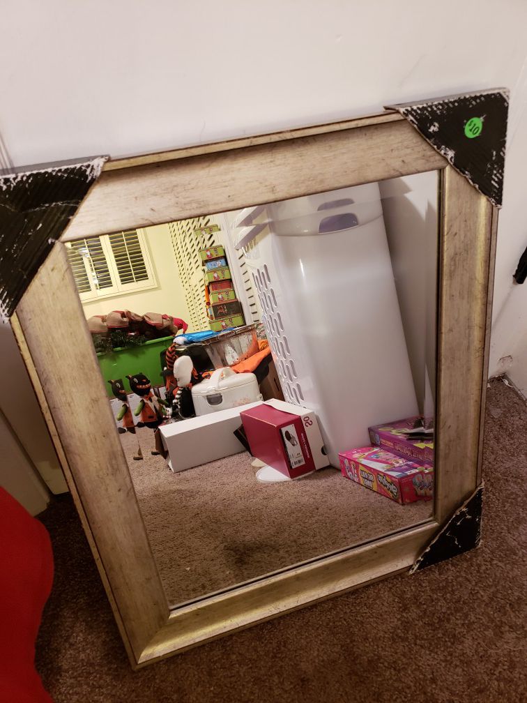 A mirror size 16x20