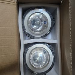 Mercedes G(contact info removed) OEM
LEFT AND RIGHT HID OEM headlights