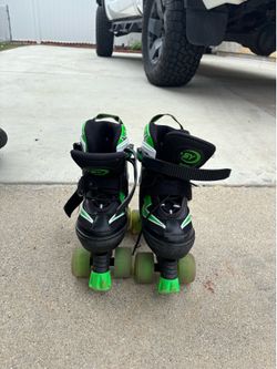 Roller blades boys medium size (1-4)